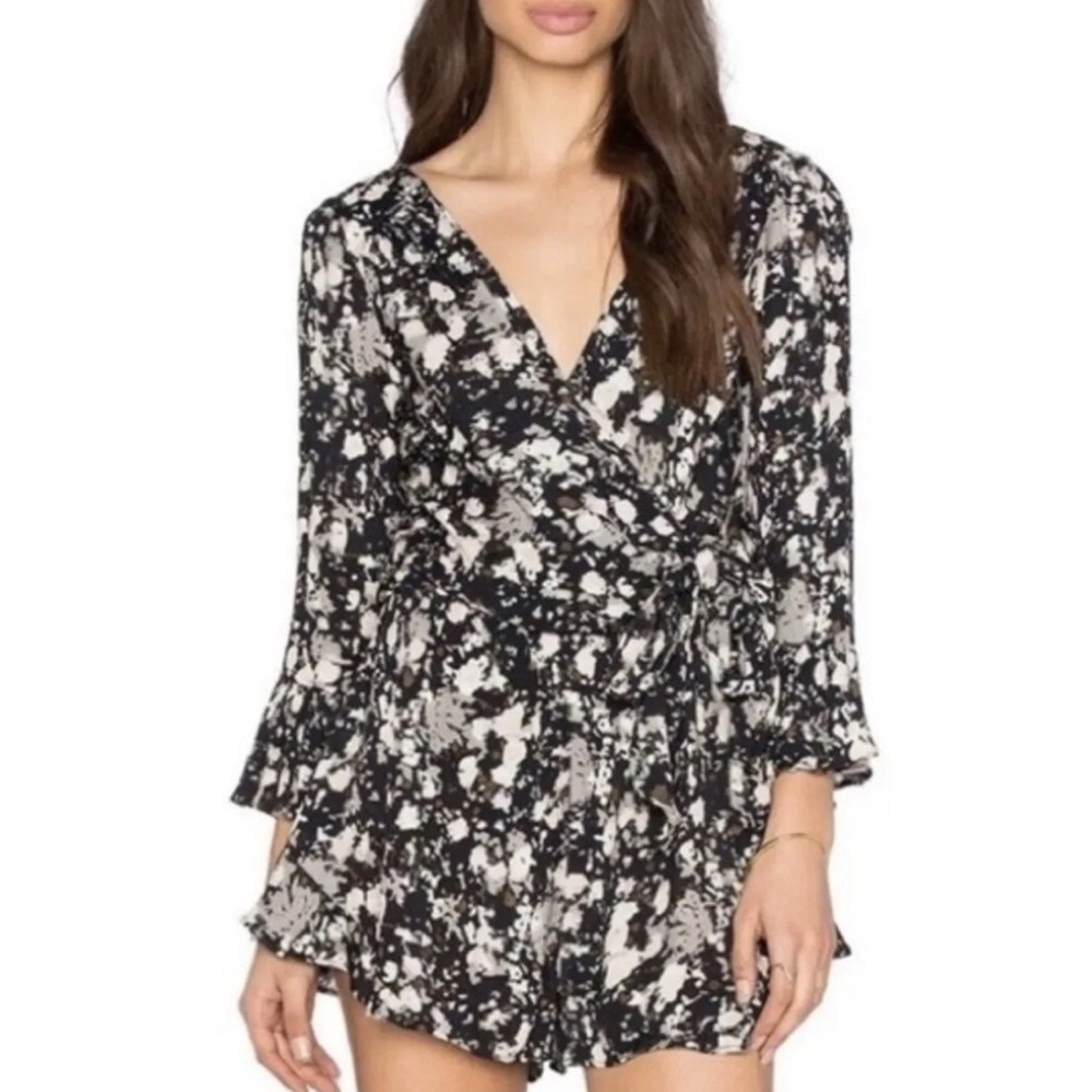 Free People romper Sz.M Black/Cream Floral wrap, long sleeve elastic waist rayon